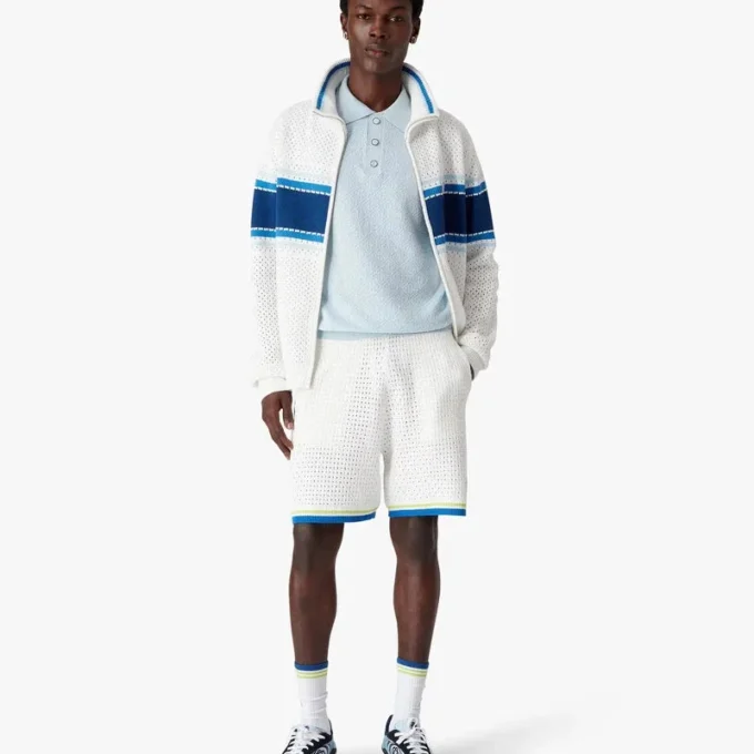Blauw Pointelle Monogram poloshirt met korte mouwen Blauw Pointelle Monogram poloshirt met korte mouwen