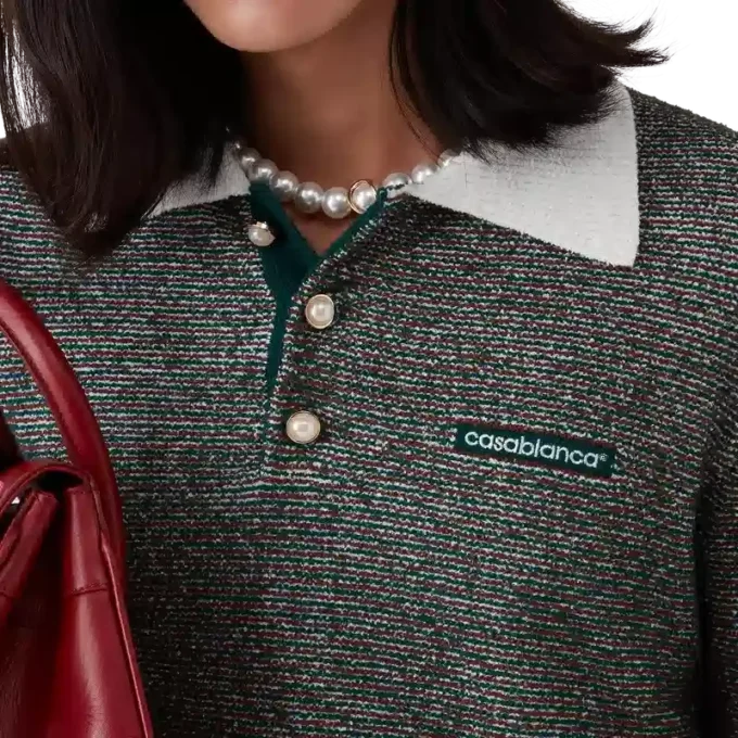 Bouclé gestreept poloshirt met lange mouwen Bouclé gestreept poloshirt met lange mouwen