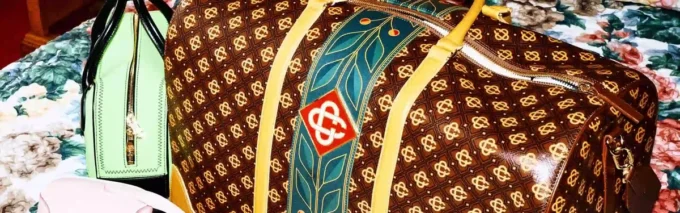 Bruine Monogram-weekendtas Bruine Monogram-weekendtas