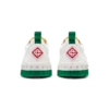 Court sneaker voor dames in wit en groen Court sneaker voor dames in wit en groen