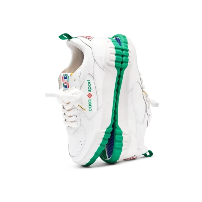 Court sneaker voor dames in wit en groen Court sneaker voor dames in wit en groen