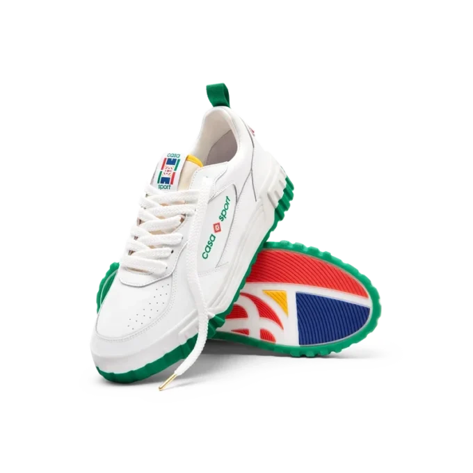 Court sneaker voor dames in wit en groen Court sneaker voor dames in wit en groen