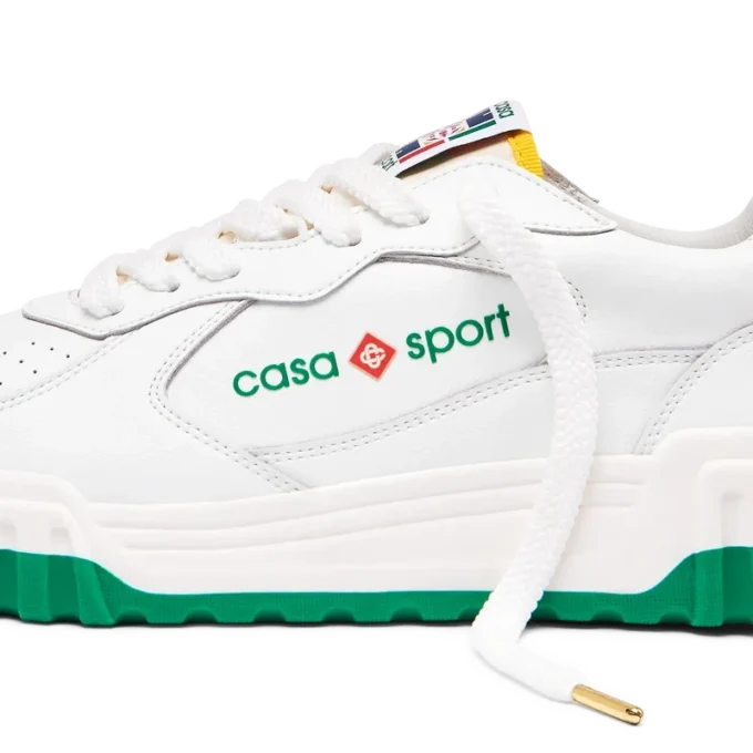 Court sneaker voor dames in wit en groen Court sneaker voor dames in wit en groen