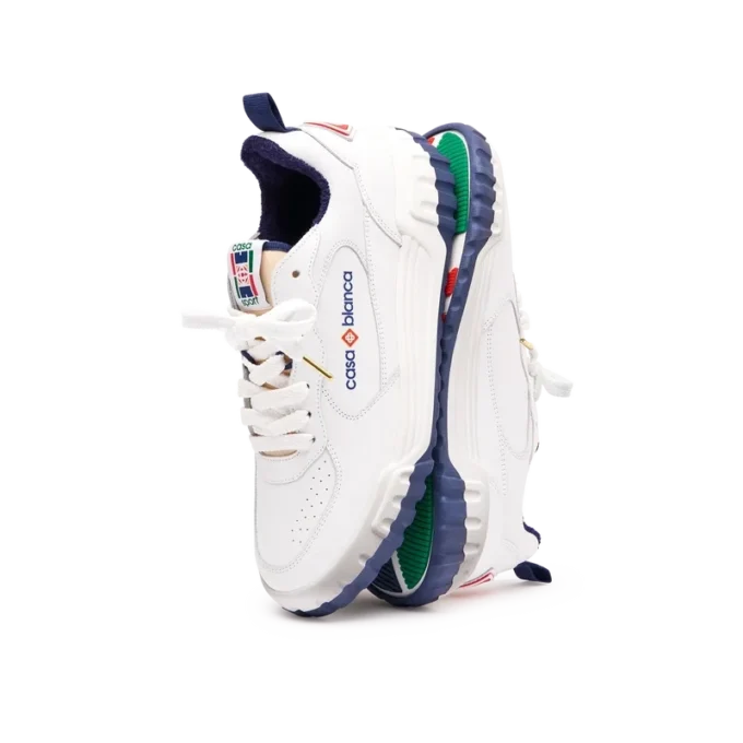 Court sneaker voor heren in wit en marineblauw Court sneaker voor heren in wit en marineblauw