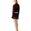 Gestrept oversized poloshirt met lange mouwen Gestrept oversized poloshirt met lange mouwen