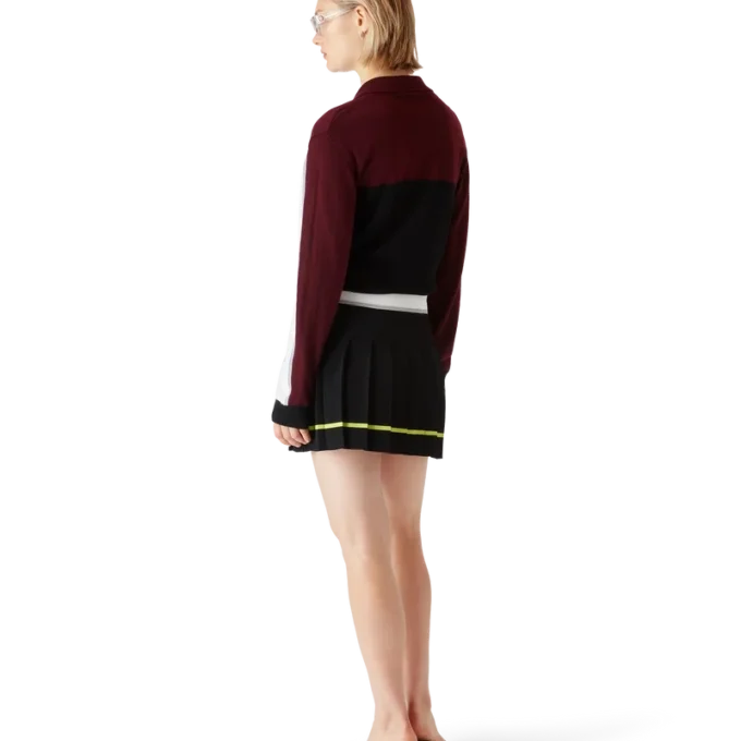 Gestrept oversized poloshirt met lange mouwen Gestrept oversized poloshirt met lange mouwen