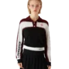Gestrept oversized poloshirt met lange mouwen Gestrept oversized poloshirt met lange mouwen