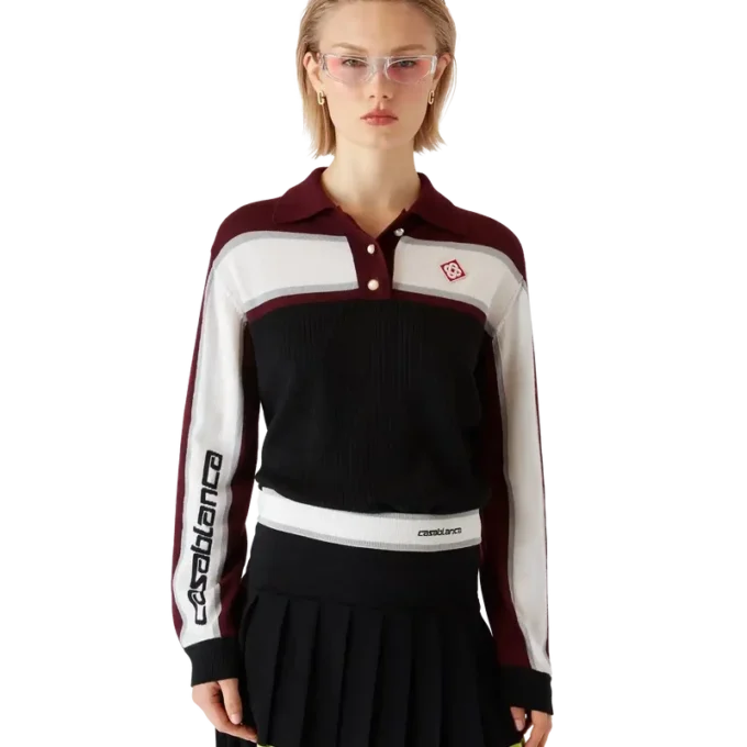 Gestrept oversized poloshirt met lange mouwen Gestrept oversized poloshirt met lange mouwen