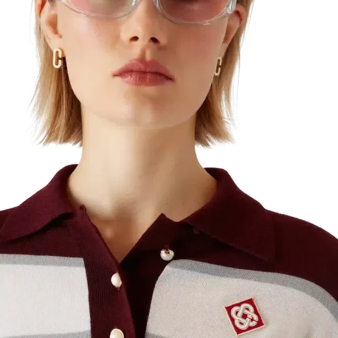 Gestrept oversized poloshirt met lange mouwen Gestrept oversized poloshirt met lange mouwen