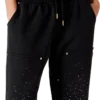 La Pramonition joggingbroek met kristallen versiering La Pramonition joggingbroek met kristallen versiering