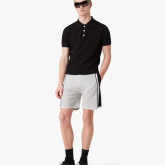 Zwart Pointelle Monogram poloshirt met korte mouwen Zwart Pointelle Monogram poloshirt met korte mouwen